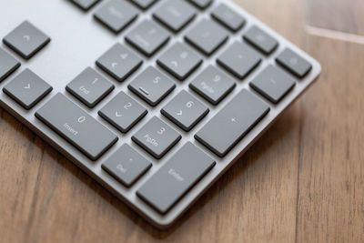Close-up of laptop keyboard on table