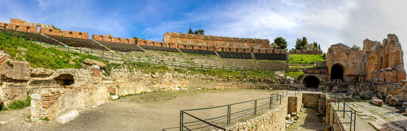 Panoramic view of old ruins against sky