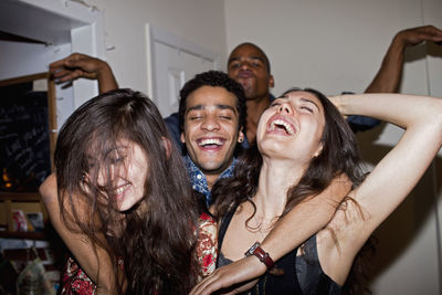 Happy friends at a party