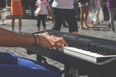 Close-up of hands at music concert