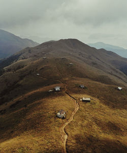 Scenic view of landscape and mountains against sky