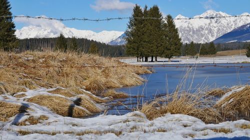 Scenic view of snowcapped mountains against sky