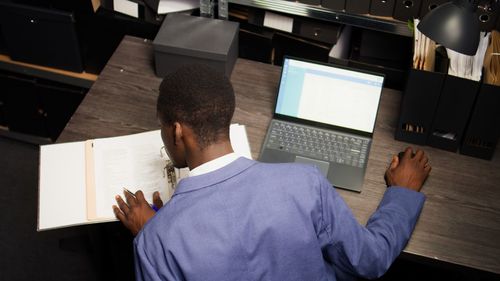 Portrait of businessman working at office