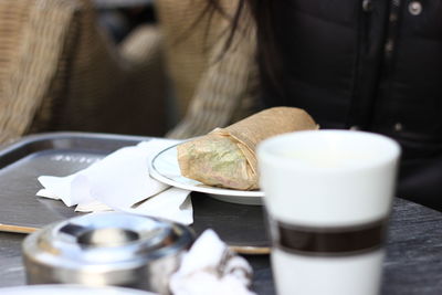 Close-up of tea cup on table