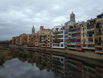 Buildings in city against sky