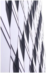 Low angle view of modern buildings against clear sky