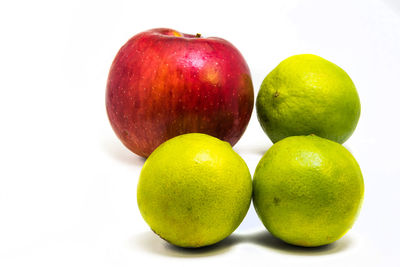 Close-up of apples on white background