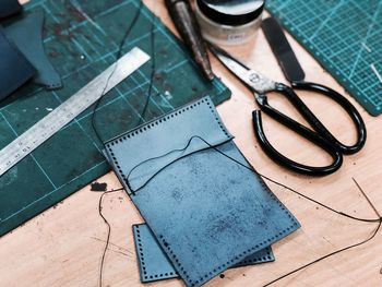 Close-up of work tools on table