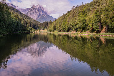 View of bavarian alps reflected by a scenic lake