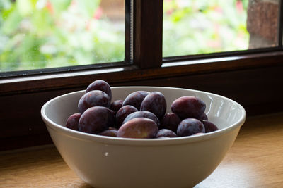Close-up of fruits in bowl on table