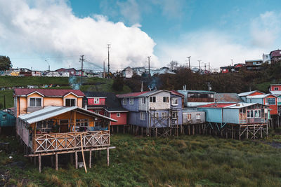 Palafitos stilted houses in castro on chiloe in chile at low tide