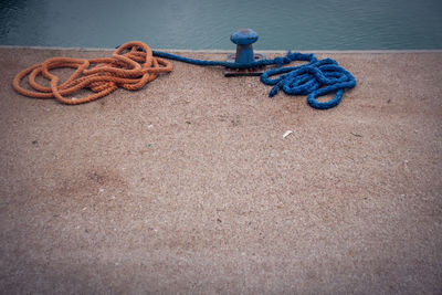 High angle view of ropes tied on rope