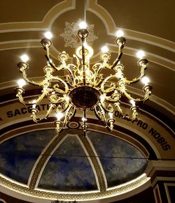 Low angle view of illuminated chandelier