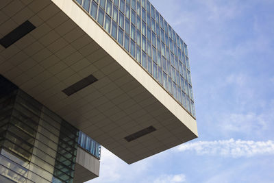 Low angle view of modern building against sky