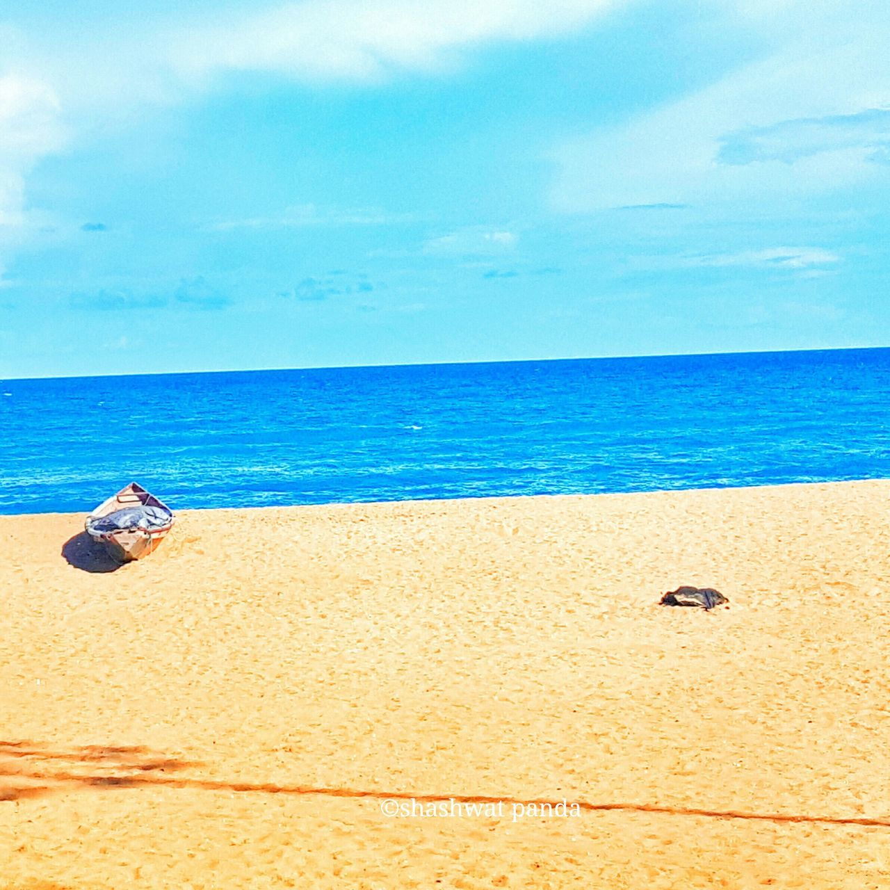 SCENIC VIEW OF SEA AGAINST BLUE SKY