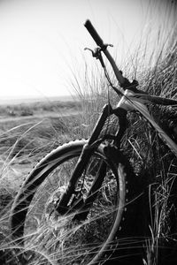 Close-up of bicycle on field