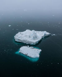 High angle view of glaciers in sea