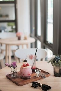 Ice cream in glass on table