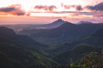 Scenic view of mountains against sky during sunset