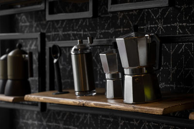 Close-up of coffee maker on table