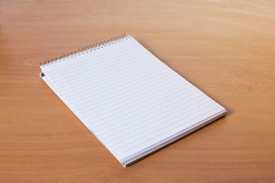 High angle view of open book on table