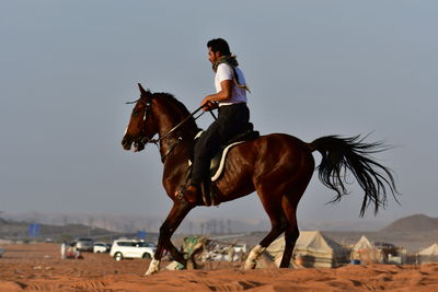 Man riding horse