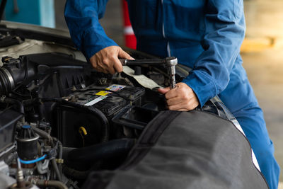 Rear view of man working