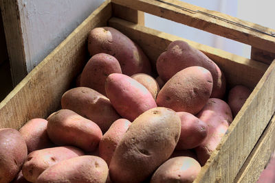 High angle view of fruits in crate at market