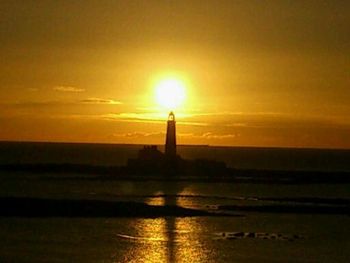 Scenic view of sunset over sea