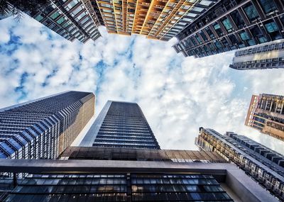 Low angle view of modern buildings against sky