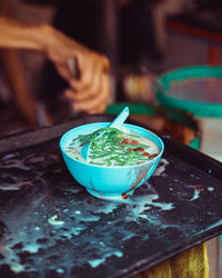 Close-up of ice cream in bowl on table