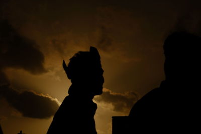 Portrait of silhouette people against sky during sunset