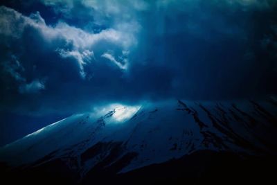 Storm clouds over cloudy sky