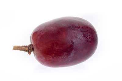 Close-up of apple against white background