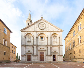 Facade of historic building against sky