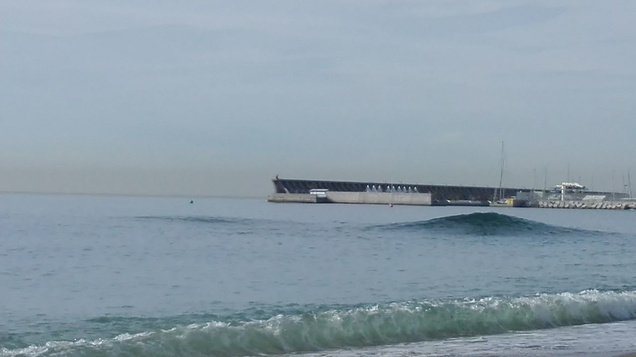 SHIP IN SEA AGAINST SKY