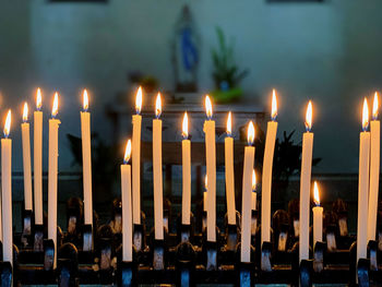 Candles burning in church