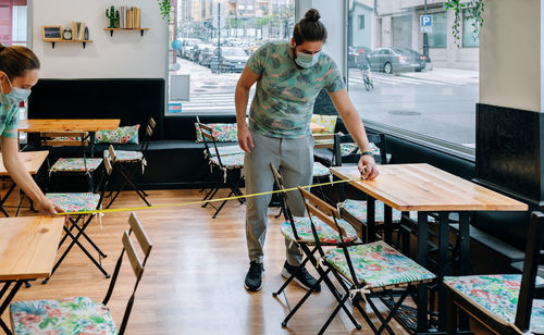 People standing on table