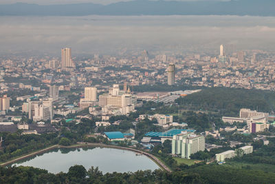 Aerial view of cityscape against sky