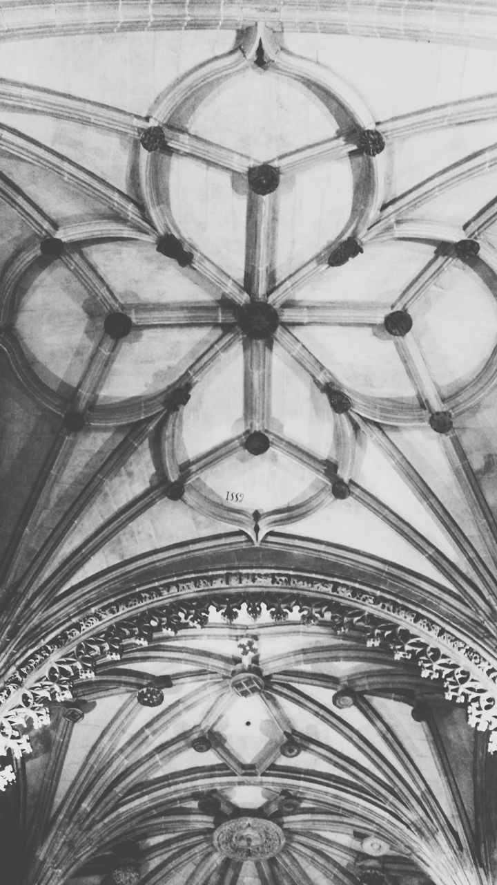 LOW ANGLE VIEW OF CEILING OF HISTORIC BUILDING