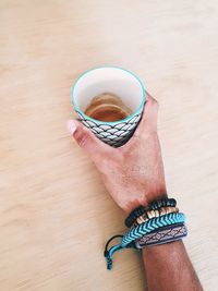 High angle view of coffee cup on table