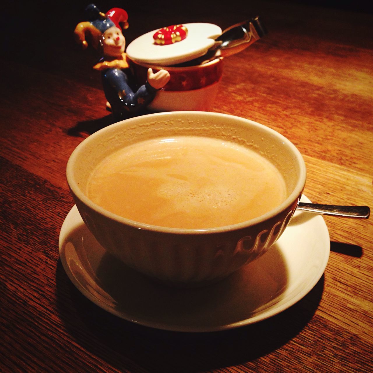 coffee cup, drink, food and drink, refreshment, coffee - drink, saucer, indoors, table, coffee, cup, freshness, frothy drink, still life, cappuccino, spoon, beverage, high angle view, hot drink, close-up, tea cup