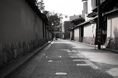 Narrow alley with buildings in background