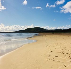 Scenic view of beach against sky