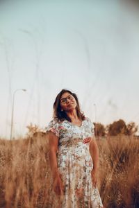 Woman standing on field