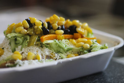 Close-up of chopped vegetables in bowl on table