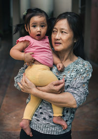 Portrait of mother and daughter