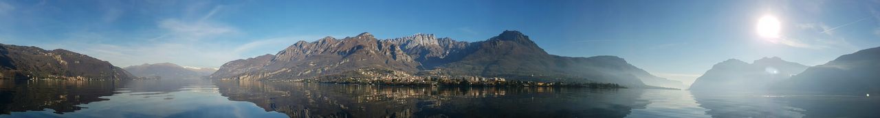 Panoramic view of lake and mountains against sky