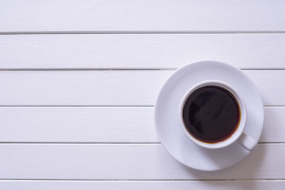 Directly above shot of black coffee on table