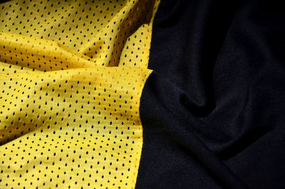 Close-up of crumpled red and black textile